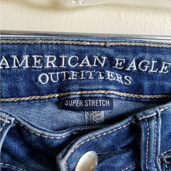 American Eagle Mid Wash Blue Distressed Ripped Mid Rise Skinny Jeans Size 00 - Picture 4 of 8